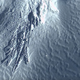 The debris field, or landslide deposit, trailing from the nearby mountain.